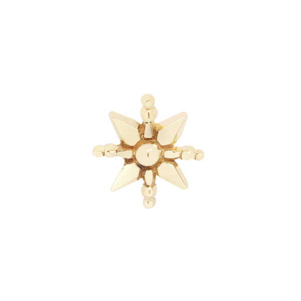 Beaded yellow gold flower with dark lacquer patina accents. Petite nose ring stud